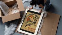 Woman dancing with white cat framed print being unpacked from protective bubble wrap and a box