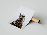 Rear-view leopard portrait poster on grey background displayed with a cardboard shipping tube