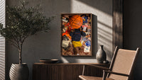 Records, Books and a Basketball poster framed above a fluted sideboard beside a potted tree