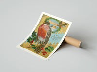 Gently curled Bird A Merry Christmas to You print beside its protective shipping tube