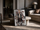 Red-Haired Shanks manga collage print in a black frame leaning on a travertine table in a sunlit lounge