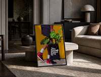 Plant Tote and Red High-Tops print on the floor, leaning against a travertine table