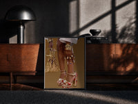 Black-framed Red Platform Heels and Mesh Bag print on the floor in front of a dark wooden console