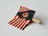 Gently curled Red Stripes and a Wide Hat print beside its protective shipping tube