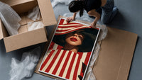 Red Stripes and a Wide Hat framed print being unpacked from protective bubble wrap and a box