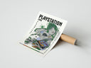 A panel of the Retro video game console triptych set rolled beside its kraft shipping tube