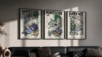Retro video game console triptych triptych in three black frames on a grey wall above a leather sofa