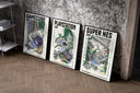 Retro video game console triptych set of three black-framed prints leaning against a raw-plaster wall