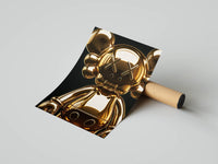 Rolled poster showing close-up KAWS face in polished gold with XX eyes on deep black
