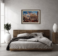 Bank of England and Royal Exchange print in a dark wood frame above a rattan bed on a plaster wall