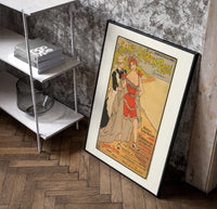 Woman in red bathing suit at beach poster in a black frame leaning beside a shelf in a raw-plaster loft