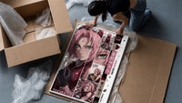 Pink-haired anime kunoichi girl framed print being unpacked from protective bubble wrap and a box