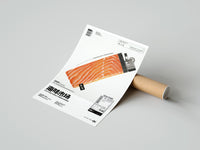 Gently curled Salmon Lighter Seafood Market print beside its protective shipping tube
