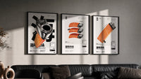 Salmon Sushi Lighter Set of 3 triptych in three black frames on a grey wall above a leather sofa