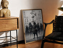 Brass-framed Samurai warriors in armor with swords print leaning in a warm styled corner by a sculpture
