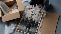 Samurai warriors in armor with swords framed print being unpacked from protective bubble wrap and a box