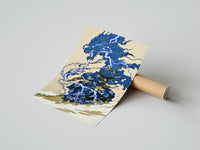 Rolled Samurai swordsman with blue lightning dragon poster beside its crush-resistant kraft shipping tube