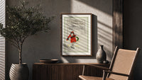 Santa Christmas Greeting poster framed above a fluted sideboard beside a potted tree