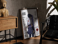 Walnut-framed Sasuke Uchiha standing with sword print leaning against a sunlit rustic brick wall