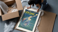 Woman riding a soap bubble framed print being unpacked from protective bubble wrap and a box