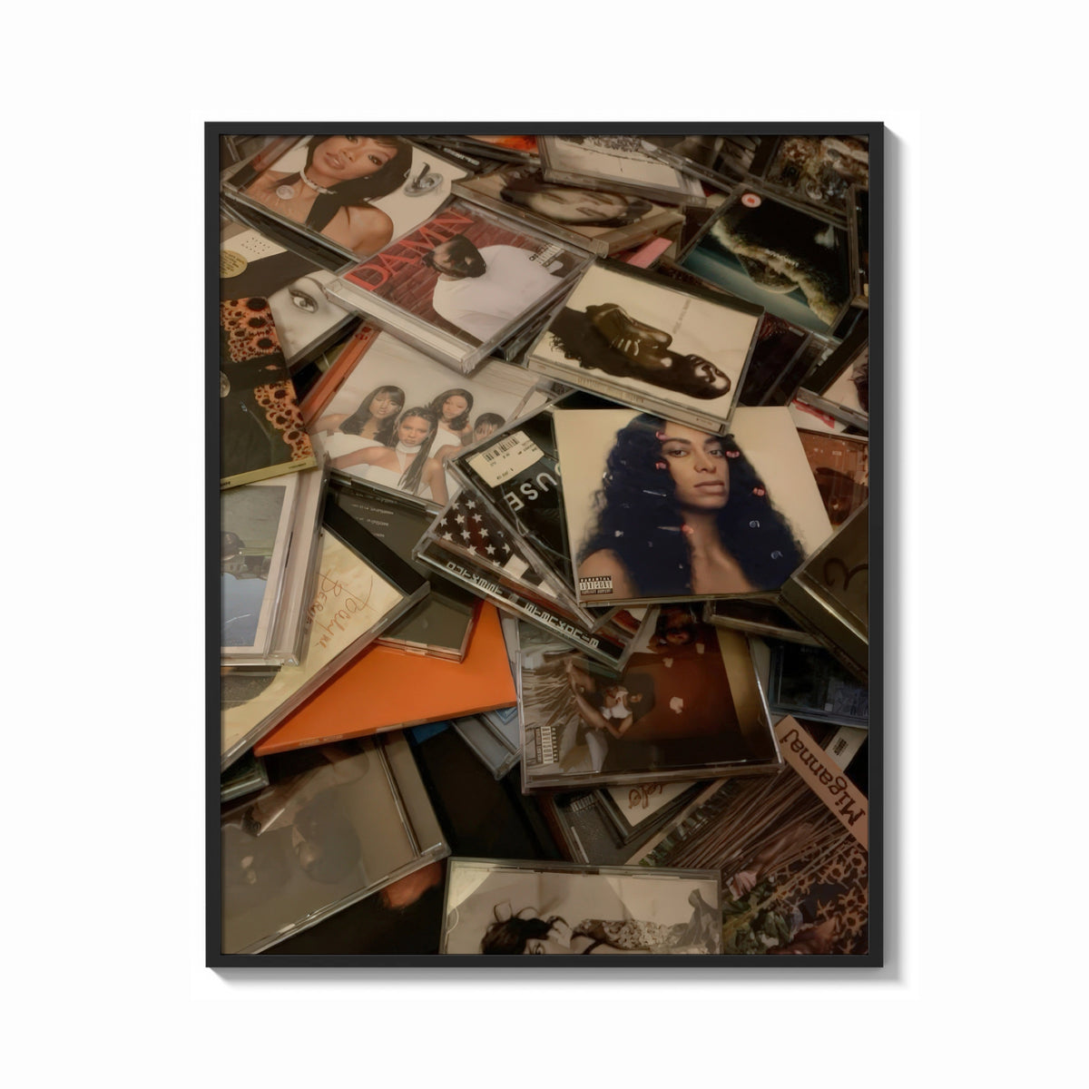 Framed Scattered CD Album Cases print shown as a bold statement piece on a clean gallery wall