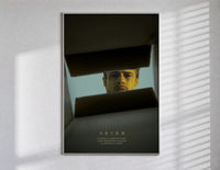Se7en box scene poster in a slim frame on a bright wall with soft window light