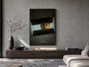Se7en box scene poster framed above a wood console in a concrete-wall living room
