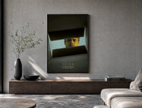 Se7en box scene poster framed above a wood console in a concrete-wall living room