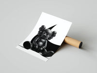Left panel showing a seated black KAWS Companion figure beside a Nike Swoosh from the Monochrome Edition