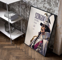 Marine fleet admiral in white uniform poster in a black frame leaning beside a shelf in a raw-plaster loft