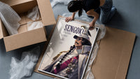 Marine fleet admiral in white uniform framed print being unpacked from protective bubble wrap and a box