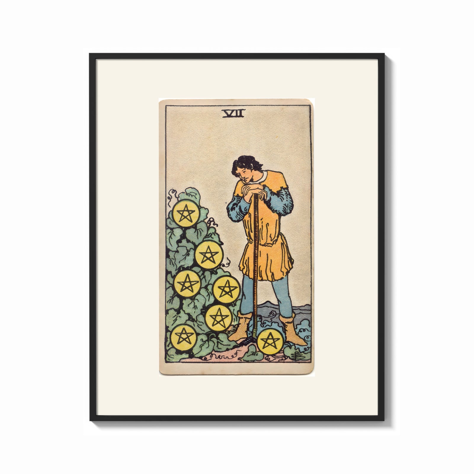 Framed Man leaning on staff with pentacles print shown as a bold statement piece on a clean gallery wall