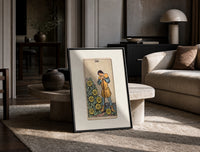 Man leaning on staff with pentacles print in a black frame leaning on a travertine table in a sunlit lounge