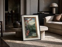 Landscape view of Paris from hills print in a black frame leaning on a travertine table in a sunlit lounge