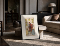 Merchant giving coins to beggars print in a black frame leaning on a travertine table in a sunlit lounge