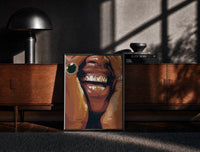 Black-framed Framed Grillz Smile print on the floor in front of a dark wooden console