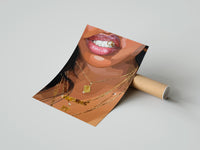 Gently curled Smile with a Butterfly Pendant print beside its protective shipping tube