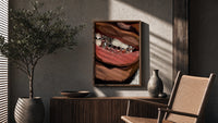 Smile with Silver Grillz poster framed above a fluted sideboard beside a potted tree