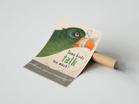 Gently curled Some Birds Talk Too Much print beside its protective shipping tube