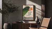 Some Birds Talk Too Much poster framed above a fluted sideboard beside a potted tree