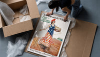 Sow the Seeds of Victory framed print being unpacked from protective bubble wrap and a box