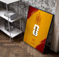 FIFA World Cup 2026 Spain emblem poster in a black frame leaning beside a shelf in a raw-plaster loft