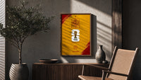 FIFA World Cup 2026 Spain emblem poster framed above a fluted sideboard beside an olive tree