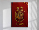Spain national football crest emblem poster in a slim frame on a bright wall with soft window light