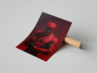 Spider-Man red suit print laying flat beside a brown cardboard shipping tube on a grey surface