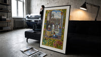Alchemist tending fire beneath fountain print in a slim black frame leaning on a dark sofa in a concrete print studio