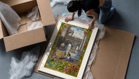 Alchemist tending fire beneath fountain framed print being unpacked from protective bubble wrap and a box