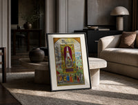 Three-headed dragon in alchemical flask print in a black frame leaning on a travertine table in a sunlit lounge