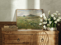 Poppy wildflower meadow landscape print in an oak frame on a farmhouse dresser beside white tulips