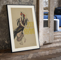 Flamenco dancer with flowers in hair print in a black frame leaning beside a vintage door on parquet